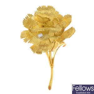 CARTIER - a 1960s 18ct gold diamond floral brooch.