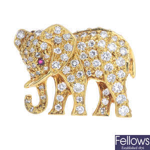 CARTIER - an 18ct gold diamond and ruby elephant pin.