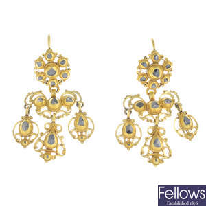 A pair of diamond girandole earrings.