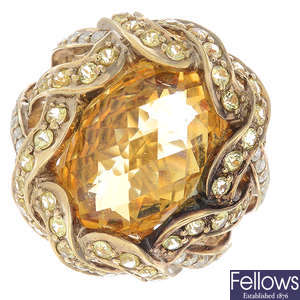 A 14ct gold citrine, yellow sapphire and diamond cocktail ring.