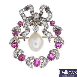 An early 20th century natural pearl, ruby and diamond pendant.