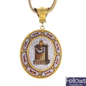 A gold micro mosaic locket and chain.