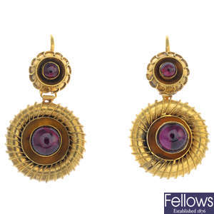 A pair of late Victorian 15ct gold garnet earrings.
