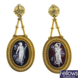 A pair of late 19th century gold onyx cameo earrings.