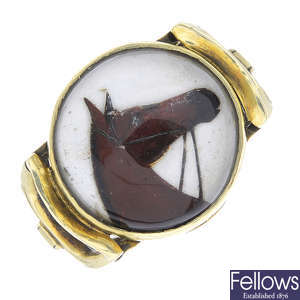 A reverse-carved crystal intaglio horse ring.