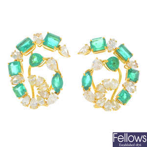 A pair of emerald and diamond clips.