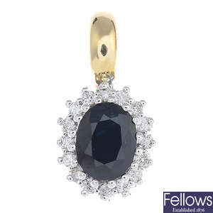 A sapphire and diamond pendant.