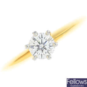 TIFFANY & CO. - an 18ct gold diamond single-stone ring.