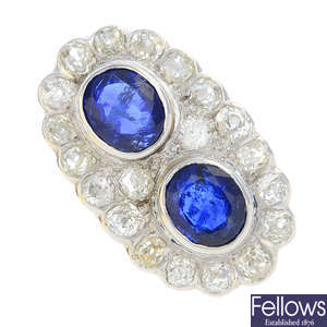 An 18ct gold Burmese sapphire and diamond double cluster ring.