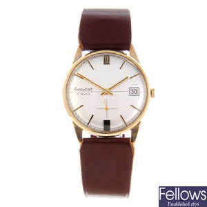ACCURIST - a gentleman's 9ct yellow gold wrist watch.
