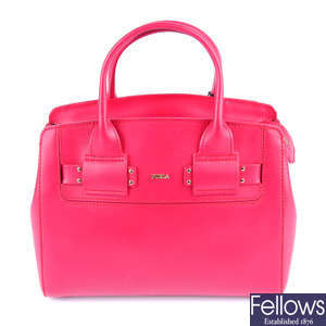 FURLA - a small red leather handbag. 