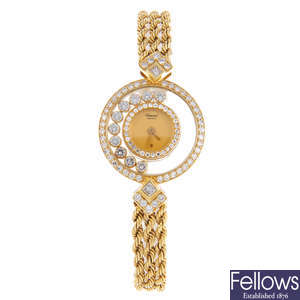 CHOPARD - a lady's yellow metal Happy Diamonds bracelet watch.