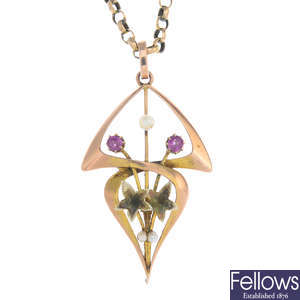 An early 20th century 9ct gold pink sapphire and seed pearl pendant, with chain.