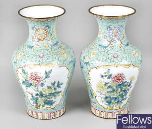 A pair of Oriental enamelled vases, together with a late 19th century moonflask vase.