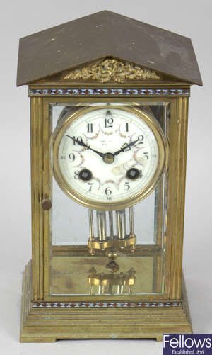 An early 20th century gilt metal and champlevÃ© enamel mantel clock.