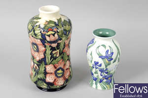 A modern Moorcroft pottery vase, together with a Benaya floral decorated vase.