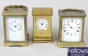 A late 19th century French gilt metal cased carriage clock, together with three other brass cased carriage clocks.