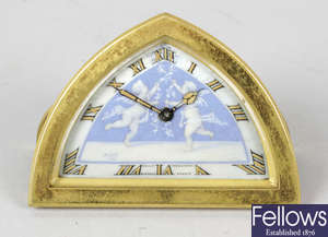 An early 20th century gilt metal easel style desk clock.