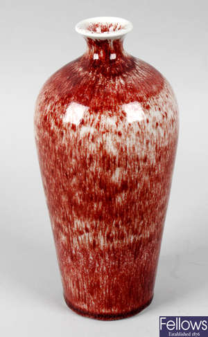 A Cobridge stoneware vase, together with four other vases.