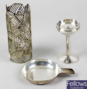 A Stuart Devlin small silver candle holder, a silver-gilt wirework vase & an ashtray marked Asprey. (3).