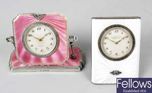 An Art Deco silver and enamelled dressing table clock, together with a silver and pink enamelled dressing table clock.