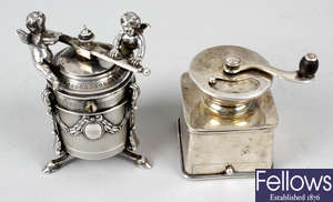 A French silver pepper grinder & a plated example. (2). 