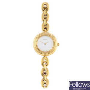 GUCCI - a lady's gold plated 11/12.2 bracelet watch.