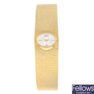 SEIKO - a lady's yellow metal bracelet watch.