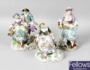 A collection of eleven assorted continental porcelain figures, to include Sitzendorf examples, etc.