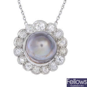 A natural pearl and diamond cluster pendant, on chain.