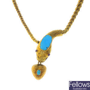 A mid Victorian gold turquoise and ruby snake necklace.