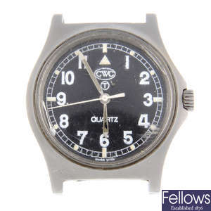 CWC - a stainless steel military issue watch head with another military issue CWC watch head and a MWC watch head.