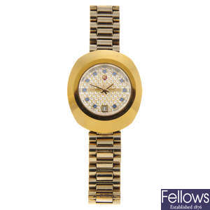 RADO - a lady's gold plated DiaStar bracelet watch together with a lady's stainless steel Gucci bracelet watch.
