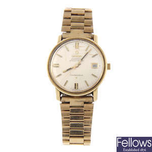 OMEGA - a gentleman's gold plated Constellation bracelet watch with a Must de Cartier watch.