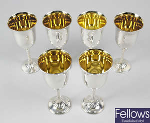 A set of six modern silver goblets.