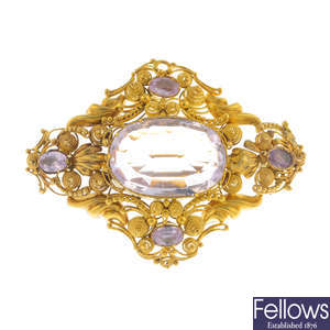 An early 19th century gold pink topaz and pink sapphire brooch.