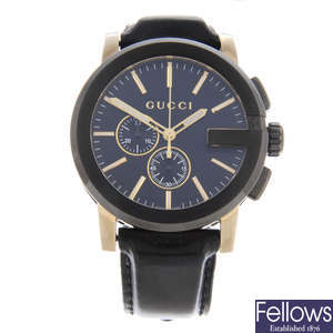 GUCCI - a gentleman's gold plated G-Chrono chronograph wrist watch with another Gucci watch.