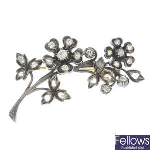 A late 19th century silver and gold diamond flower brooch.
