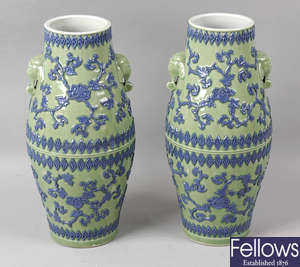 A pair of Oriental vases, a Melba ware pottery character jug 'Shylock', and another Burlington ware example.