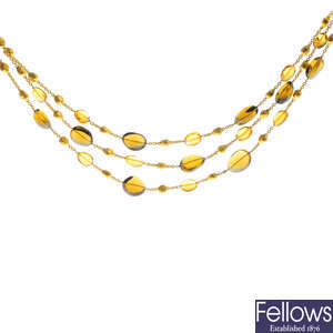 MARCO BICEGO - an 18ct gold citrine multi-strand necklace.
