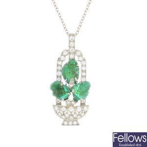An Art Deco platinum emerald and diamond pendant, with later 14ct gold chain.