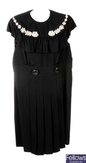 MIU MIU - a black embellished pleated dress.