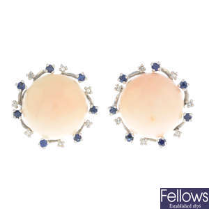 A pair of coral, diamond and sapphire earrings.