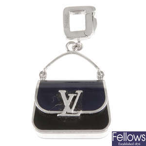 LOUIS VUITTON - an 18ct white gold handbag charm.