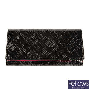 LOVE MOSCHINO - a faux patent leather double sided clutch.