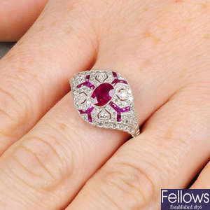 A ruby and diamond pierced geometric dress ring.