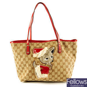 GUCCI - a special edition Monogram Brando Guccioli Holiday Chihuahua handbag.
