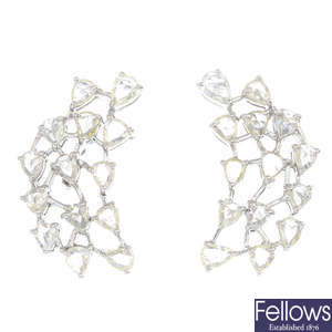 A pair of diamond openwork earrings.