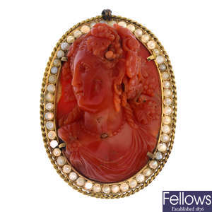 A coral cameo and split pearl brooch.