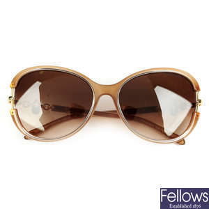 TIFFANY & CO. - a pair of sunglasses.